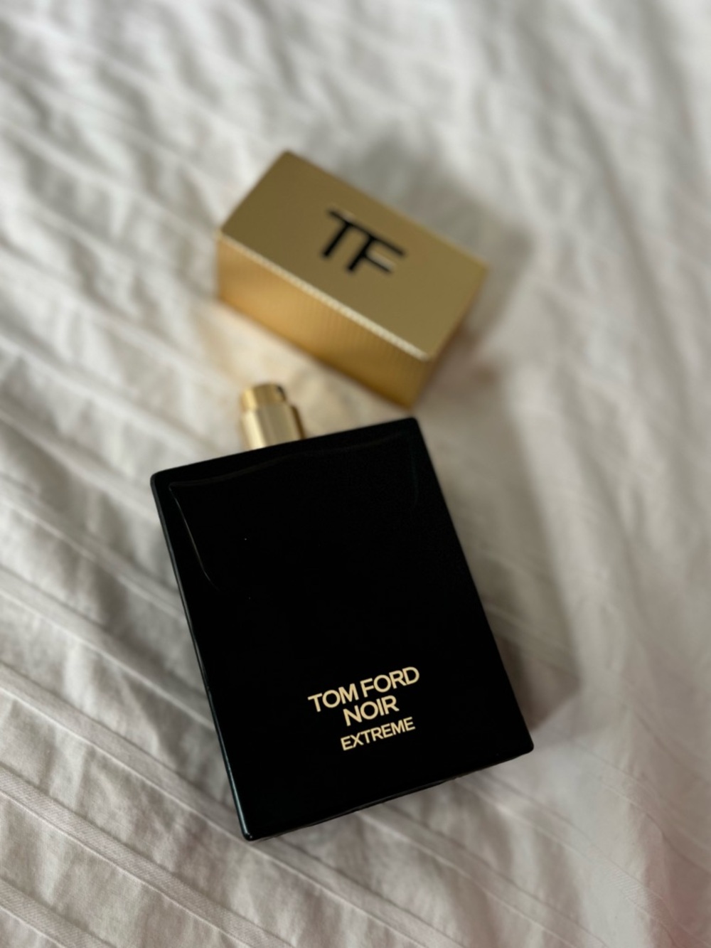 Tom Ford Noir Extreme Bottle in Black and Gold